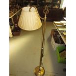 Modern brass standard lamp with brushed finish