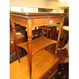 Small Edwardian mahogany and inlaid fold-over card table raised on square tapering supports with