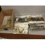 Box containing a quantity of various reproduction enlarged photographs of Caterham etc.