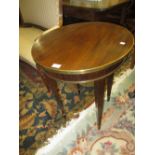 Circular mahogany and brass mounted occasional table on square tapering supports with further