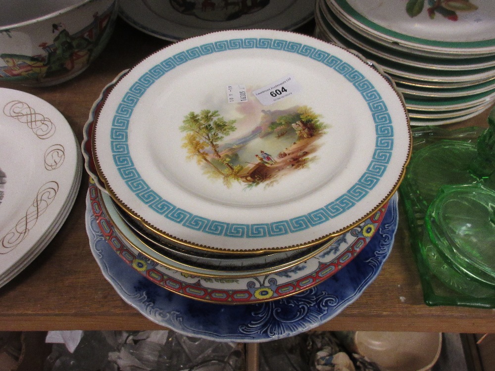 Two 19th Century cabinet plates painted with a lake scene and flowers together with a quantity of