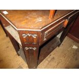 1940's Oak single drawer side table with linen fold carved decoration and undertier, 31ins high,