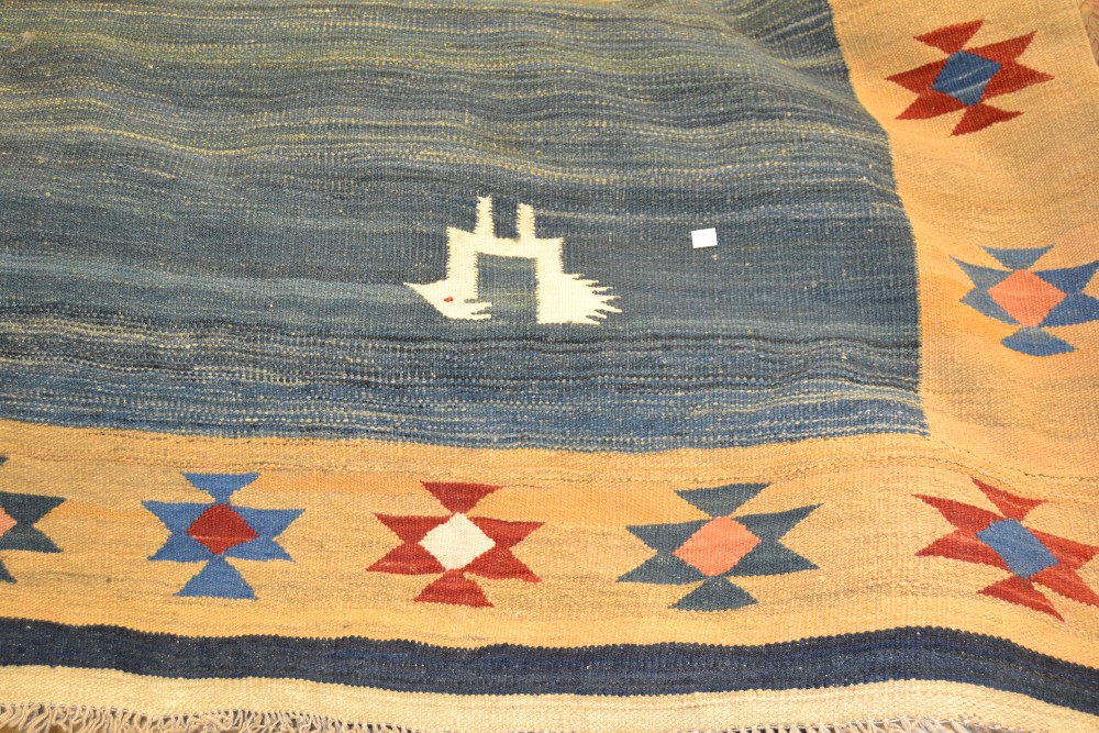 Kelim rug of floral design on black ground, together with another Kelim rug on blue ground Black - Image 2 of 2