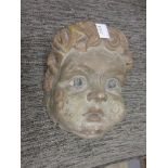 Antique carved polychrome painted mask head corbel