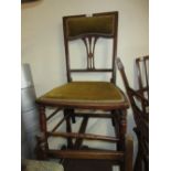 Edwardian line inlaid mahogany nursing chair on turned supports and an early 20th Century folding