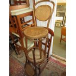 Pair of bentwood chairs with cane seats and backs (at fault) and a 19th Century ladder back