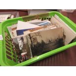 Green carton containing a quantity of topographical postcards