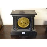 19th Century French black slate mantel clock, the circular engraved gilt dial with Roman numerals,