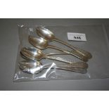 Set of five George III silver bright cut teaspoons together with another similar