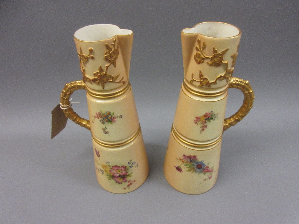 Pair of Worcester blush ivory jug vases in japanesque style painted with flowers, 10.25ins high