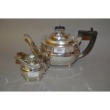 20th Century Chester silver teapot in Georgian style together with a similar Birmingham silver cream