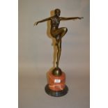 Reproduction Art Deco style dark patinated bronze figure of a girl dancer on a marble plinth,