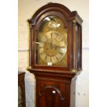 George III mahogany longcase clock, the arched hood flanked by turned columns above an arched