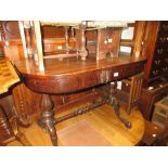 19th Century rosewood library table on faceted turned column supports and swept carved legs (at