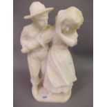 Carved alabaster group of a boy and girl, 15ins high