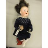 Armand Marseille, German bisque headed doll with fixed eyes and open mouth, the head inscribed