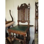 19th Century oak hall chair having carved back with green padded seat and barley twist supports