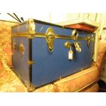 Metal mounted blue rexine travel trunk
