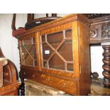 Early 20th Century oak medicine cabinet with two bar glazed doors above two drawers