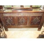 18th Century oak three panel coffer with chip carved decoration on stile end supports, 44ins wide,