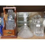 Thomas Webb square cut glass decanter, together with two other square decanters, two ships decanters