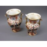 Two 19th Century English two handled vases decorated in red, green, blue and gilt (both with