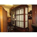 Early 20th Century mahogany bow fronted two door display cabinet with cabriole legs