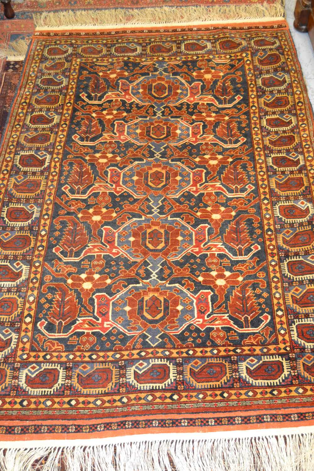 Mid 20th Century Shirvan design rug of five center geometric medallions with multiple borders on a