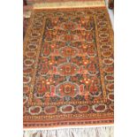 Mid 20th Century Shirvan design rug of five center geometric medallions with multiple borders on a
