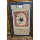 Small modern sample rug with floral design on a beige ground mounted in a gilt frame, signed