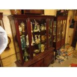 Mid 20th Century Continental stained wood and burr walnut display cabinet, the central bevelled