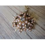 Victorian yellow gold star pendant brooch set single old brilliant cut diamond and split seed pearls