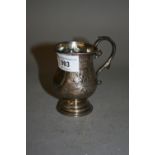 Victorian silver floral embossed Christening mug with scroll handle, Birmingham, 1872, maker