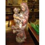 Late 19th / early 20th Century carved pine polychrome painted figure of Madonna and child, 21ins