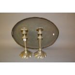 Pair of 19th Century plated rococo design candlesticks (at fault), 12ins high, together with a large