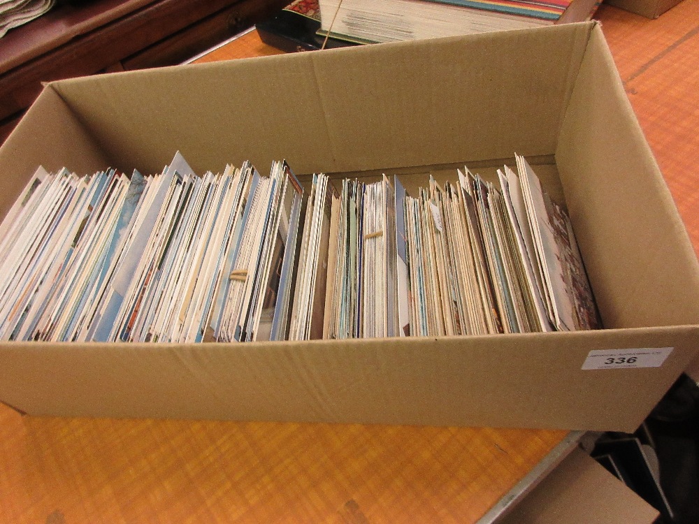 Box containing a collection of various postcards of Surrey