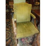 George III mahogany open armchair, the overstuffed back and seat covered in green striped fabric