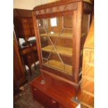 Early 20th Century oak display cabinet with a single bar glazed door together with an oak dwarf open