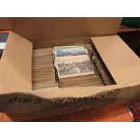 Large box containing a collection of various Continental postcards