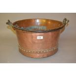 Heavy 19th Century riveted copper preserve pan with iron swing handle Some small marks and dents