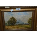 Oil on canvas board, landscape with hay stooks, 7ins x 9.5ins, gilt framed