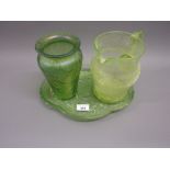 20th Century green iridescent glass vase, green glass jug and a dressing table tray