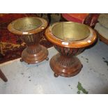 Matched pair of 19th Century walnut and line inlaid jardinieres, the circular tops with brass