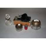 Two nurses belts, three dressing table bottles and a small cranberry glass and silver mounted