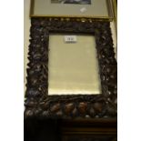 Rectangular carved hardwood picture frame in the form of ivy leaves, aperture 8.75ins x 6.25ins