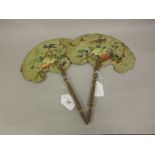 Pair of early 19th Century papier mache face screens painted with birds and foliage, with turned and