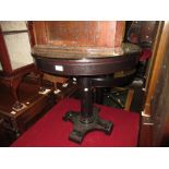 Pair of black ash circular glass topped occasional tables on platform bases, together with a