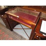 Mid 20th Century mahogany rectangular bijouterie display cabinet on square chamfered supports with