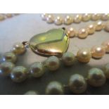 Garrard & Co., cultured pearl necklace with 18ct yellow gold heart shaped clasp, in original box