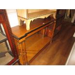 20th Century simulated wood console table with ebonised mouldings and undertier with mirrored back